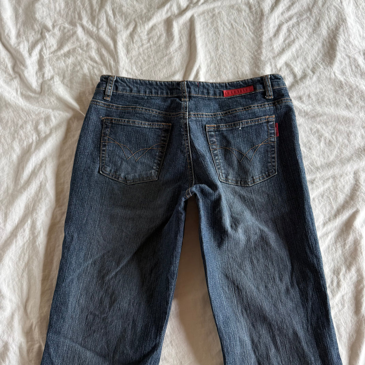 Identità Low-Rise Dark Wash Flared Jeans - Size S