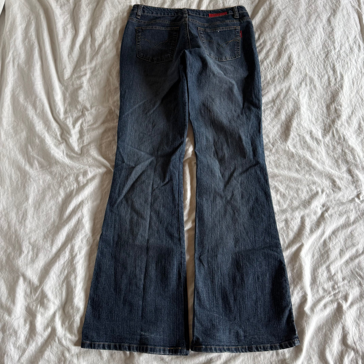 Identità Low-Rise Dark Wash Flared Jeans - Size S