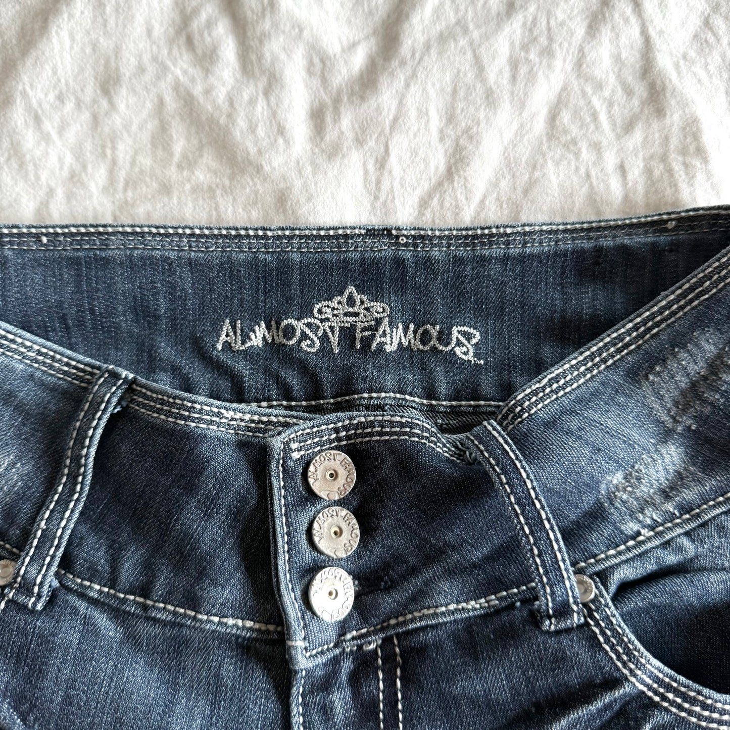 Almost Famous Low-Rise Dark Wash Ripped Flared Jeans - Size XS
