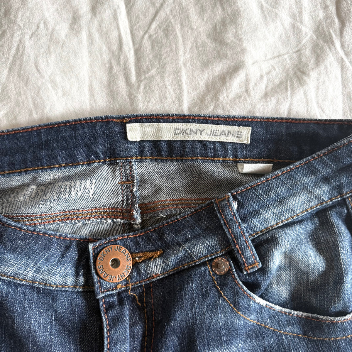 DKNY Low-Rise Medium Wash Bootcut Jeans - Size S